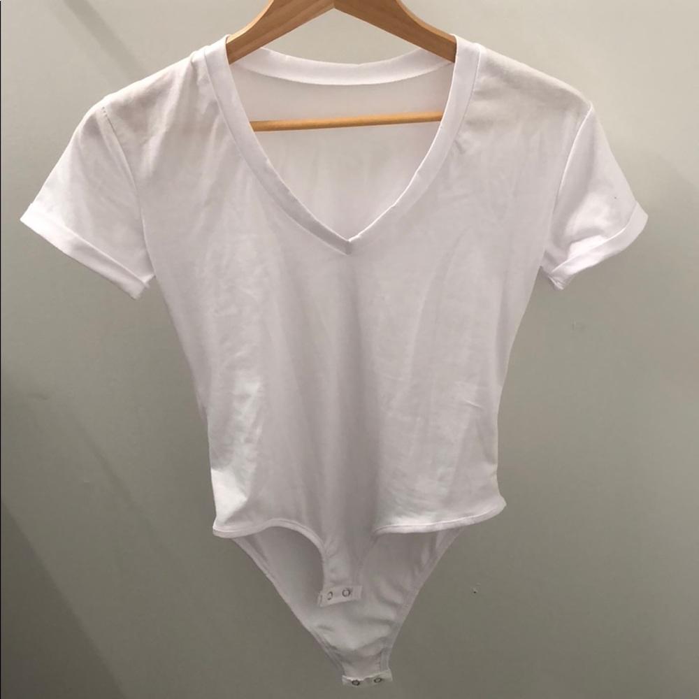 Brand new white body suit